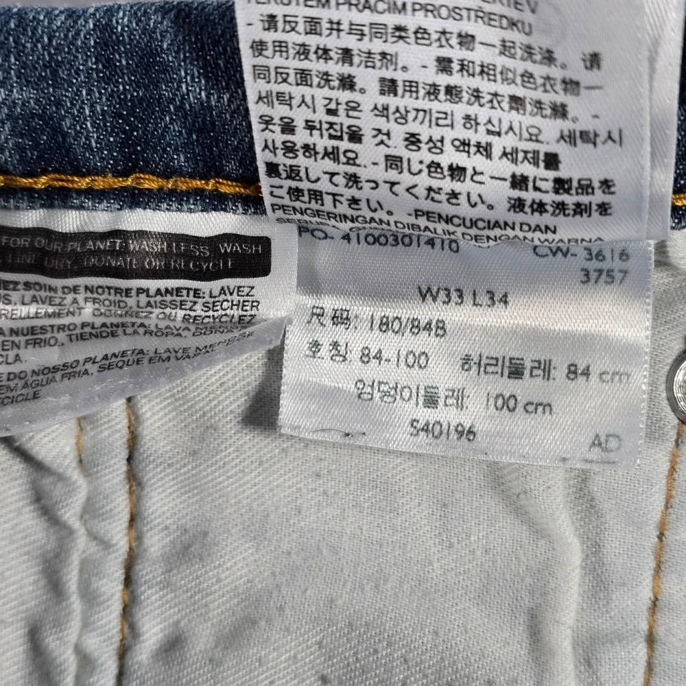 Levis 502 Regular Taper Mens Blue Jeans Medium Wash Stretch 33x34 14376